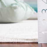 Safavieh Mason 100 4'-0" x 6'-0" Rug in Beige / Dark Grey