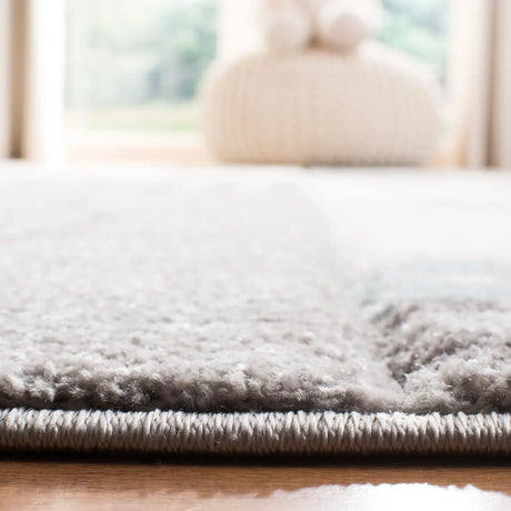 Safavieh Carousel Kids 100 4'-0" x 6'-0" Rug in Grey / Ivory
