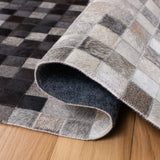 Safavieh Studio Leather 4'-0" x 6'-0" Rug in Ivory / Black