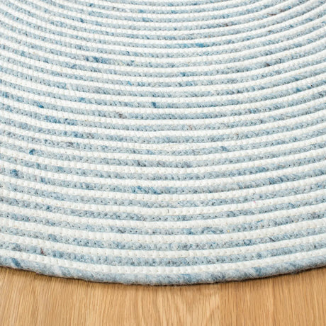 Safavieh Braided 5'-0" x 7'-0" Rug in Grey / Ivory