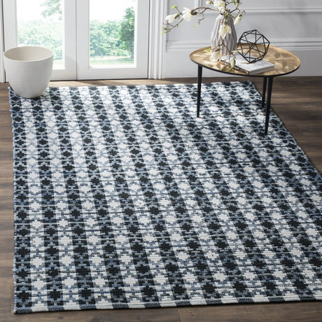 Safavieh Montauk 5'-0" x 8'-0" Rug in Ivory Blue / Black