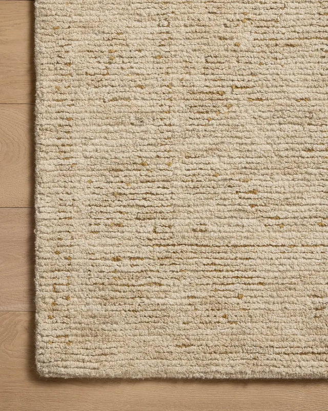 Loloi Penny PEN-01 Gold / Natural Rug - corner on wood