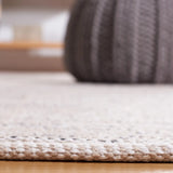 Safavieh Montauk 4'-0" x 6'-0" Rug in Beige / Ivory