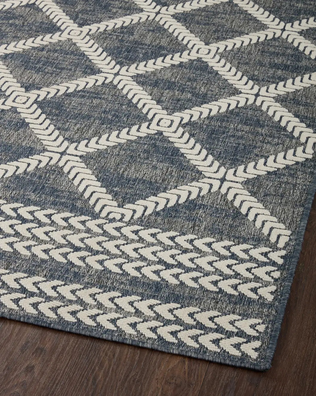 Loloi Rainier Rai-05 Denim/Ivory Rug - angled corner on wood