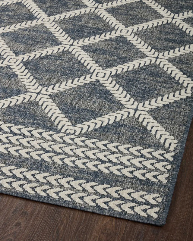 Loloi Rainier Rai-05 Denim/Ivory Rug - angled corner on wood
