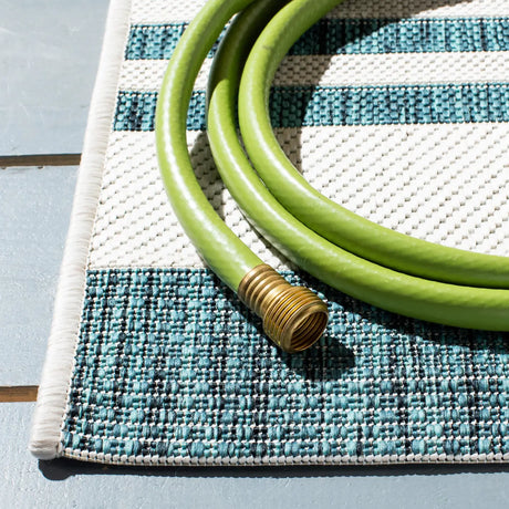 Safavieh Courtyard 4'-0" x 5'-7" Rug in Ivory / Teal