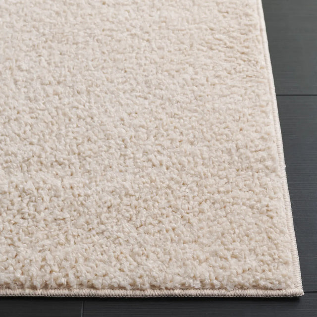 Safavieh Boucle 100 5'-0" x 7'-0" Rug in Beige
