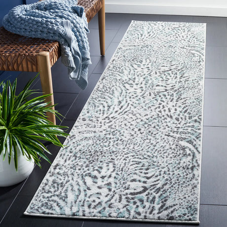 Safavieh Amsterdam 2'-3" x 8'-0" Rug in Ivory / Teal