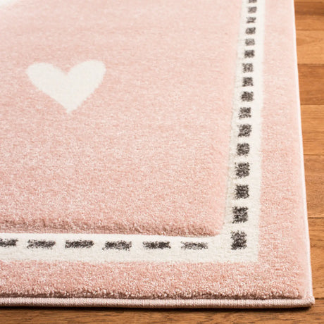 Safavieh Carousel Kids 100 4'-0" x 6'-0" Rug in Pink / Ivory