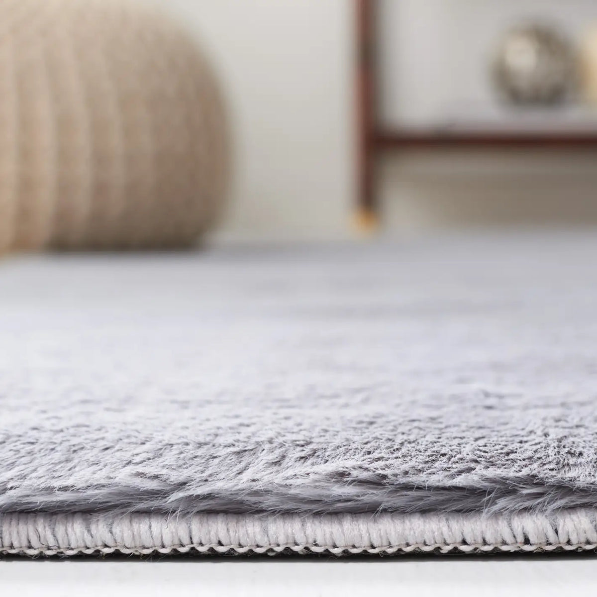 Safavieh Faux Rabbit Fur 5'-0" x 7'-0" Rug in Light Grey