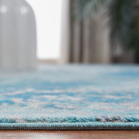 Safavieh Aria 4'-0" x 6'-0" Rug in Light Blue / Ivory