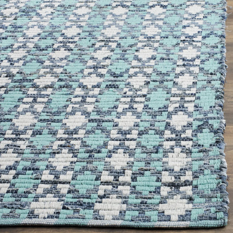 Safavieh Montauk 5'-0" x 8'-0" Rug in Turquoise / Multi
