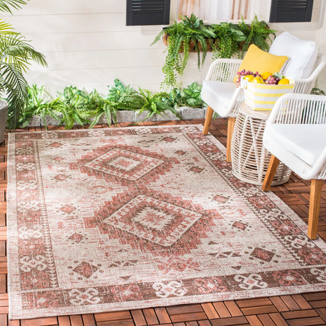 Safavieh Courtyard 5'-3" x 7'-7" Rug in Beige / Red