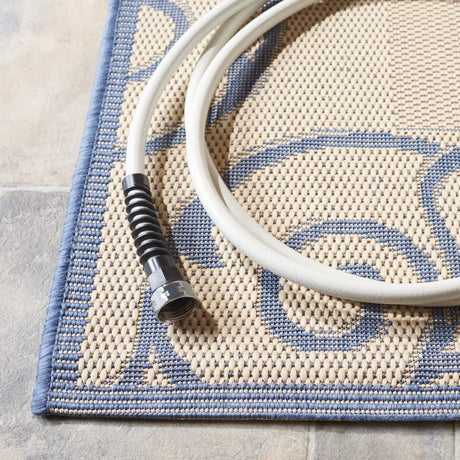Safavieh Courtyard 5'-3" x 7'-7" Rug in Natural / Blue