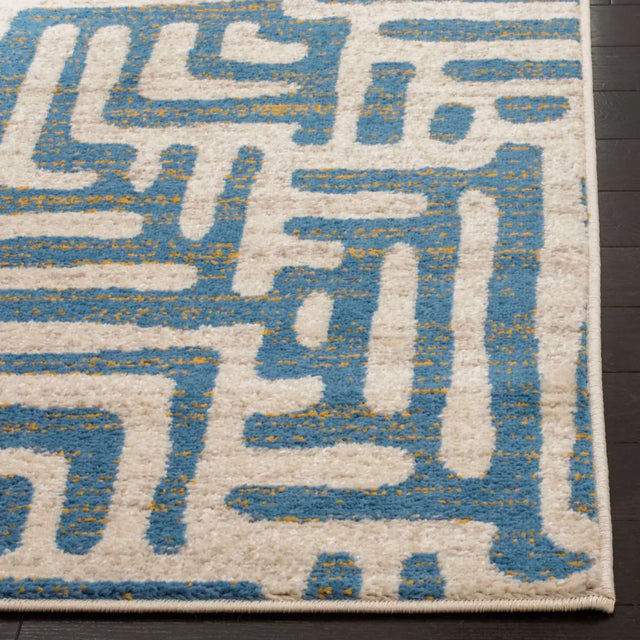 Safavieh Amsterdam 5'-1" x 7'-6" Rug in Ivory / Light Blue