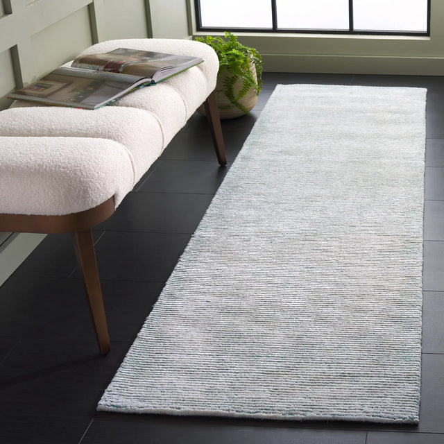 Safavieh Soho 2'-3" x 8'-0" Rug in Turquoise / Ivory