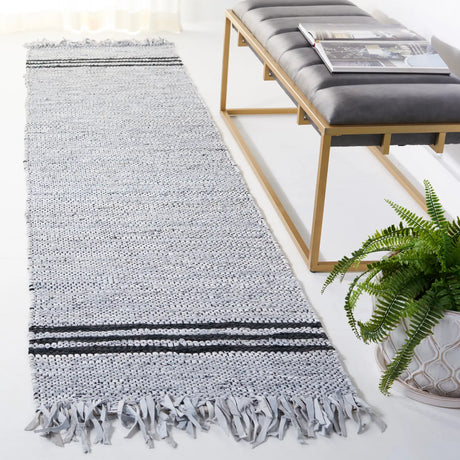 Safavieh Vintage Leather 2'-3" x 9'-0" Rug in Ivory / Black