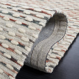 Safavieh Marbella 4'-0" x 6'-0" Rug in Beige / Rust