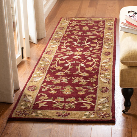 Safavieh Heritage 2'-3" x 10'-0" Rug in Red / Gold