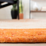 Safavieh Braided 5'-0" x 7'-0" Rug in Orange / Ivory