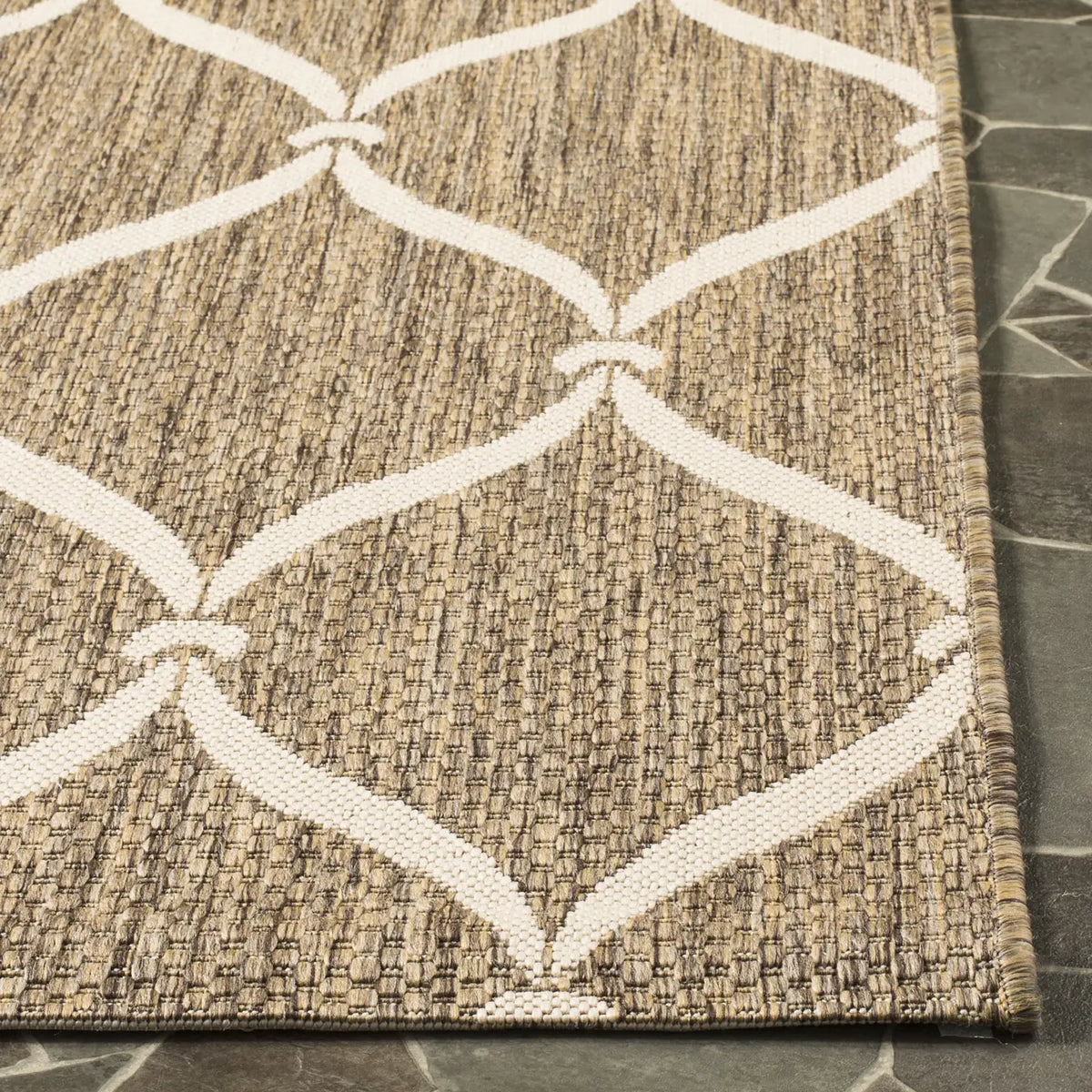 Safavieh Courtyard 5'-3" x 7'-7" Rug in Brown / Beige