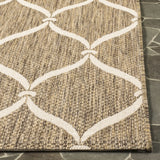 Safavieh Courtyard 5'-3" x 7'-7" Rug in Brown / Beige