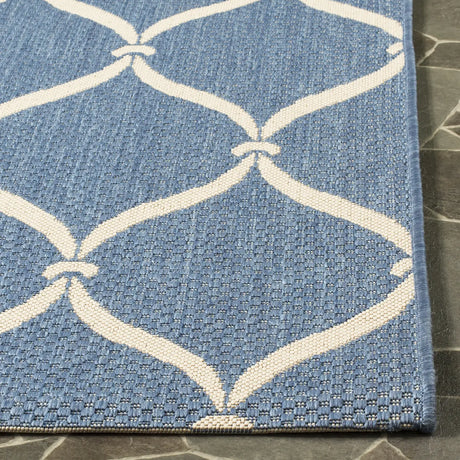 Safavieh Courtyard 5'-3" x 7'-7" Rug in Blue / Beige
