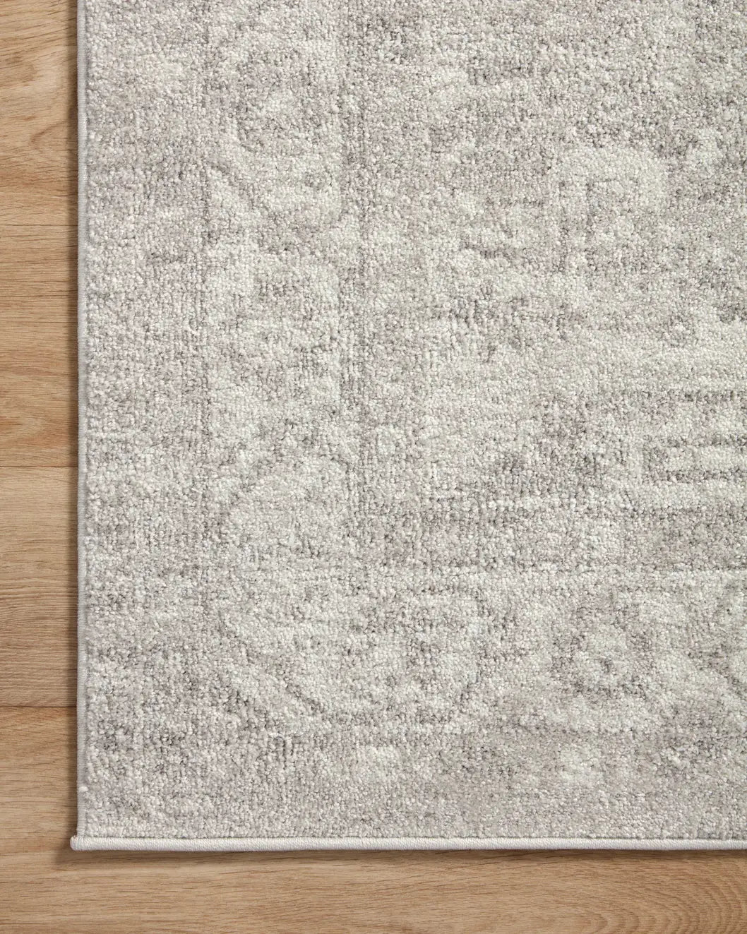 Loloi Odette Odt-02 Silver/Ivory Rug - corner on wood