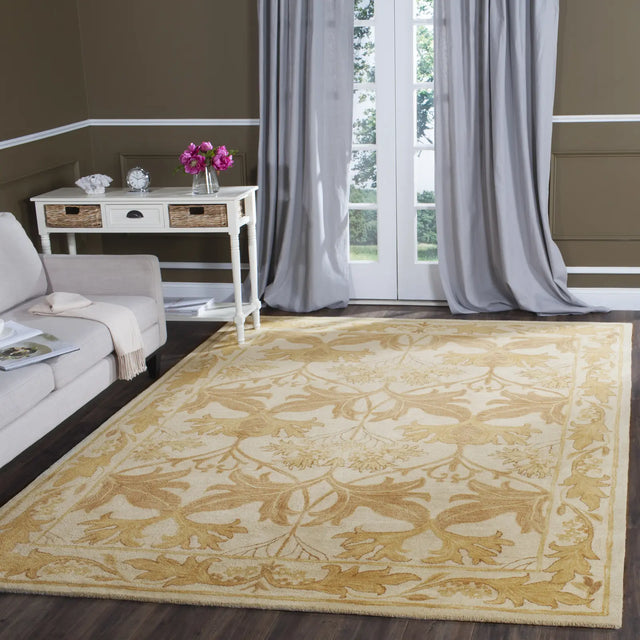 Safavieh Antiquity 9'-6" x 13'-6" Rug in Beige / Gold