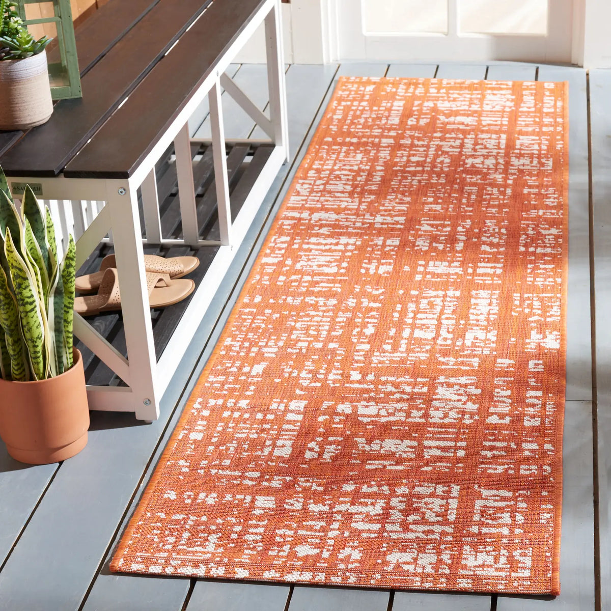 Safavieh Courtyard 2'-3" x 8'-0" Rug in Orange / Ivory