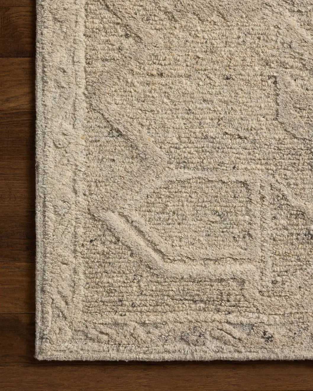 Loloi Mabel MBL-01 Traditional Hand Tufted Pebble, Mist Rug - corner on wood