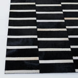Safavieh Studio Leather 4'-0" x 6'-0" Rug in Black / Beige