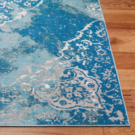 Safavieh Aria 4'-0" x 6'-0" Rug in Light Blue / Ivory