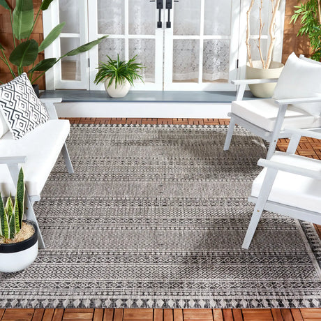 Safavieh Courtyard 6'-7" x 9'-6" Rug in Black / Beige