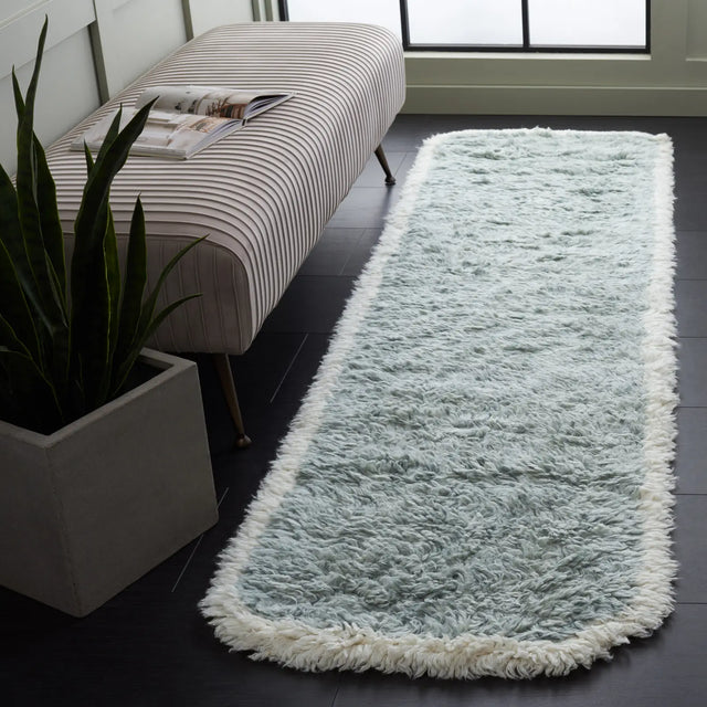 Safavieh Casablanca 2'-3" x 8'-0" Rug in Teal / Ivory