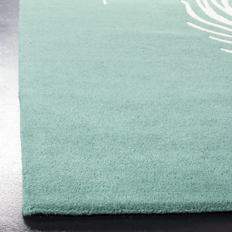 Safavieh Soho 5'-0" x 8'-0" Rug in Teal / Ivory