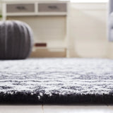 Safavieh Micro-Loop 4'-0" x 6'-0" Rug in Black / Ivory