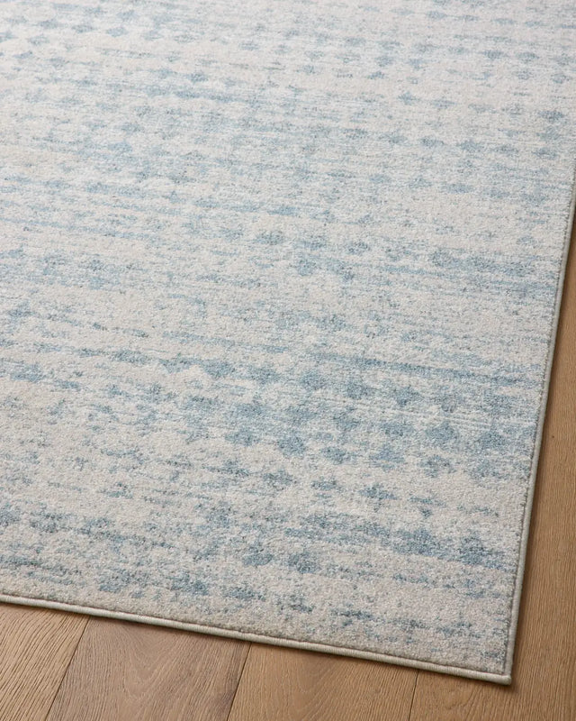 Loloi Kamala Kam-04 Sky/Dove Rug - angled corner on wood
