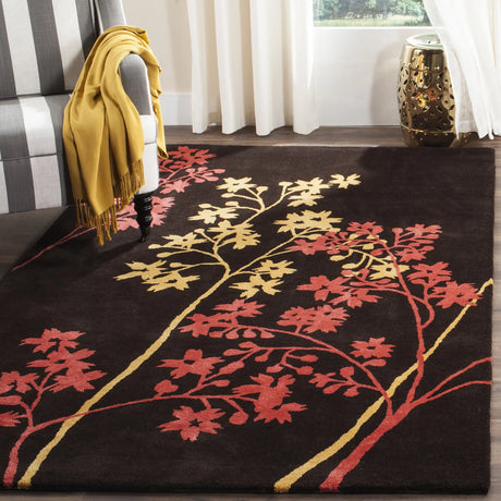 Safavieh Soho 5'-0" x 8'-0" Rug in Brown / Red