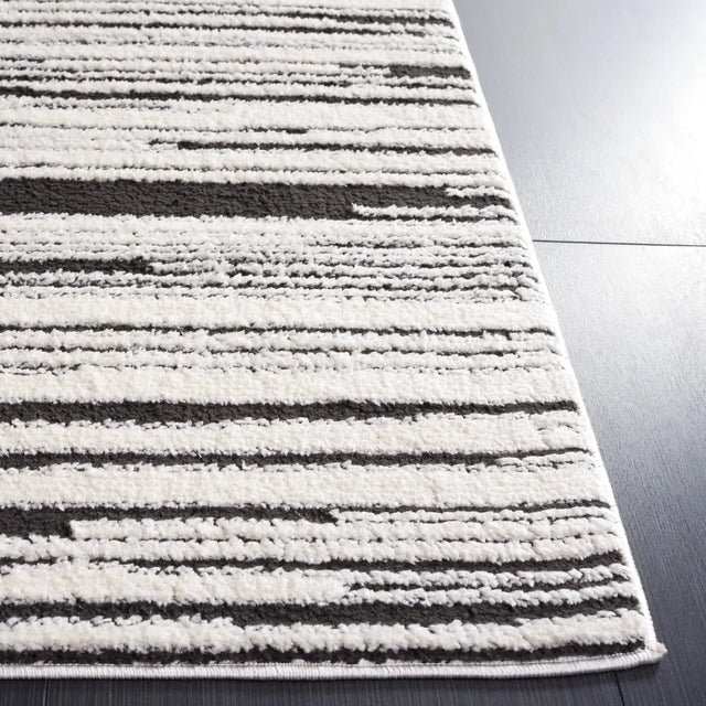 Safavieh Melody 4'-0" x 6'-0" Rug in Ivory / Black