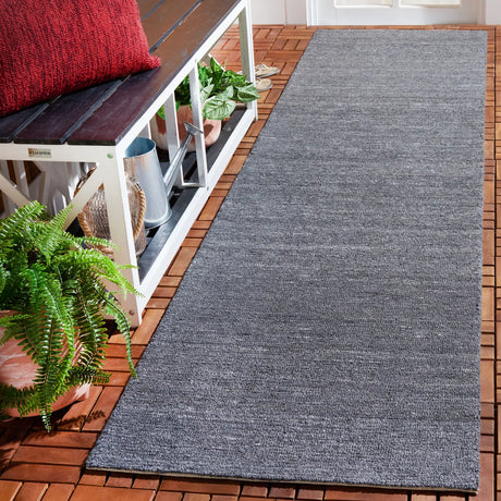 Safavieh Outdoor Micro-Loop 2'-3" x 9'-0" Rug in Dark Grey