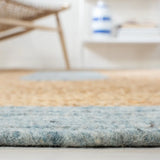 Safavieh Braided 5'-0" x 7'-0" Rug in Light Blue / Gold