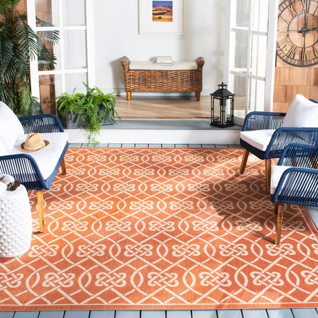 Safavieh Courtyard 6'-7" x 9'-6" Rug in Terracotta / Light Beige