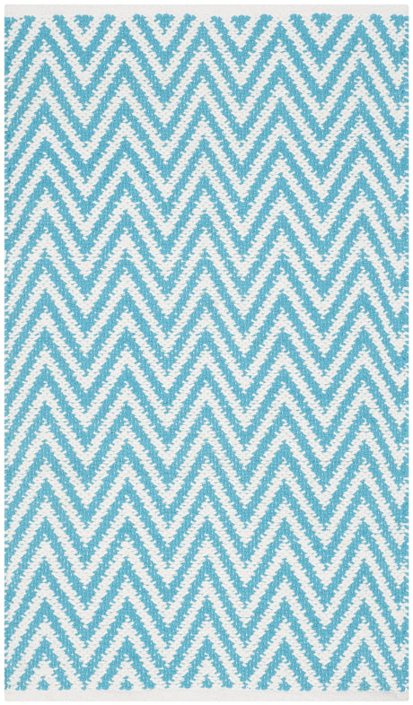 Safavieh Montauk 2'-6" x 4'-0" Rug in Turquoise / Ivory