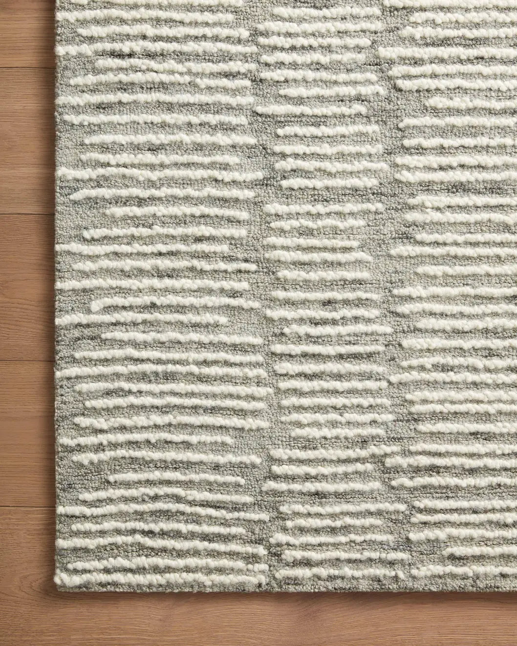 Loloi Tallulah Tll-04 Stone/Ivory Rug - corner on wood