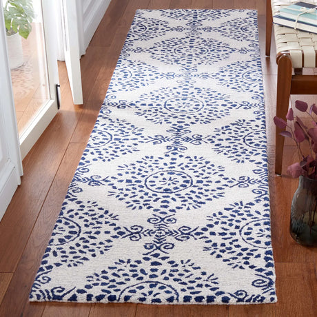 Safavieh Micro-Loop 2'-3" x 9'-0" Rug in Ivory / Blue