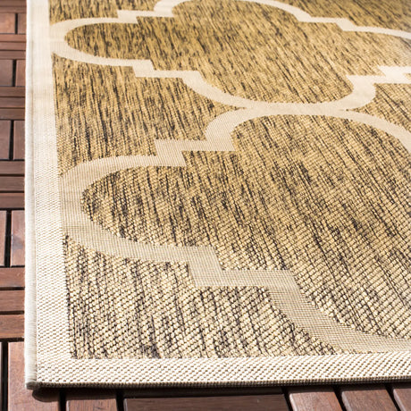 Safavieh Courtyard 5'-3" x 7'-7" Rug in Brown