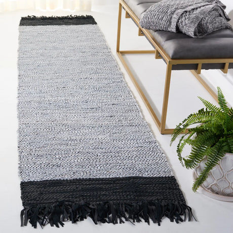 Safavieh Vintage Leather 2'-3" x 9'-0" Rug in Ivory / Black