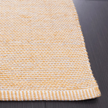 Safavieh Montauk 4'-0" x 6'-0" Rug in Yellow / Ivory
