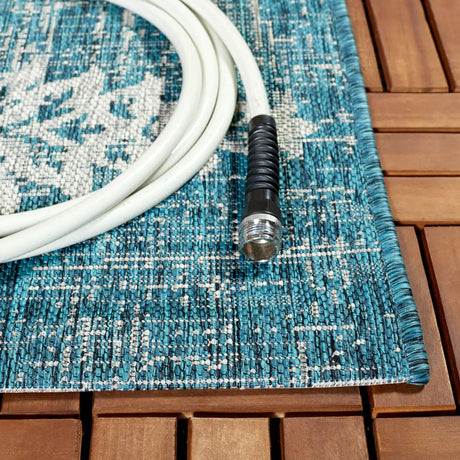 Safavieh Courtyard 6'-7" x 9'-6" Rug in Teal / Grey